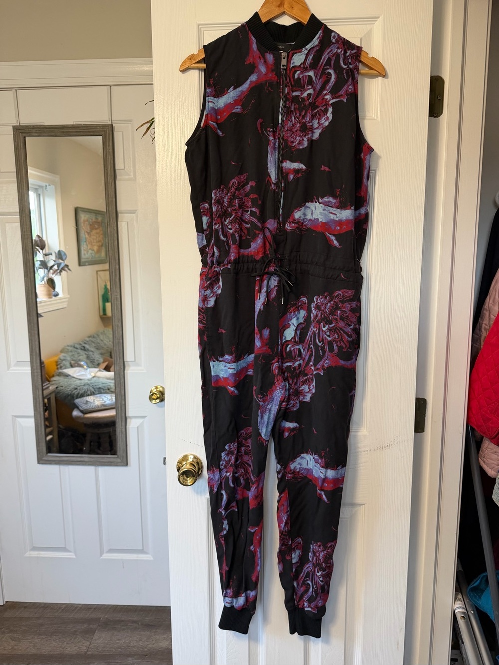 Diesel Black Sleeveless Floral-Print Jumpsuit with Red and Light Blue Accents